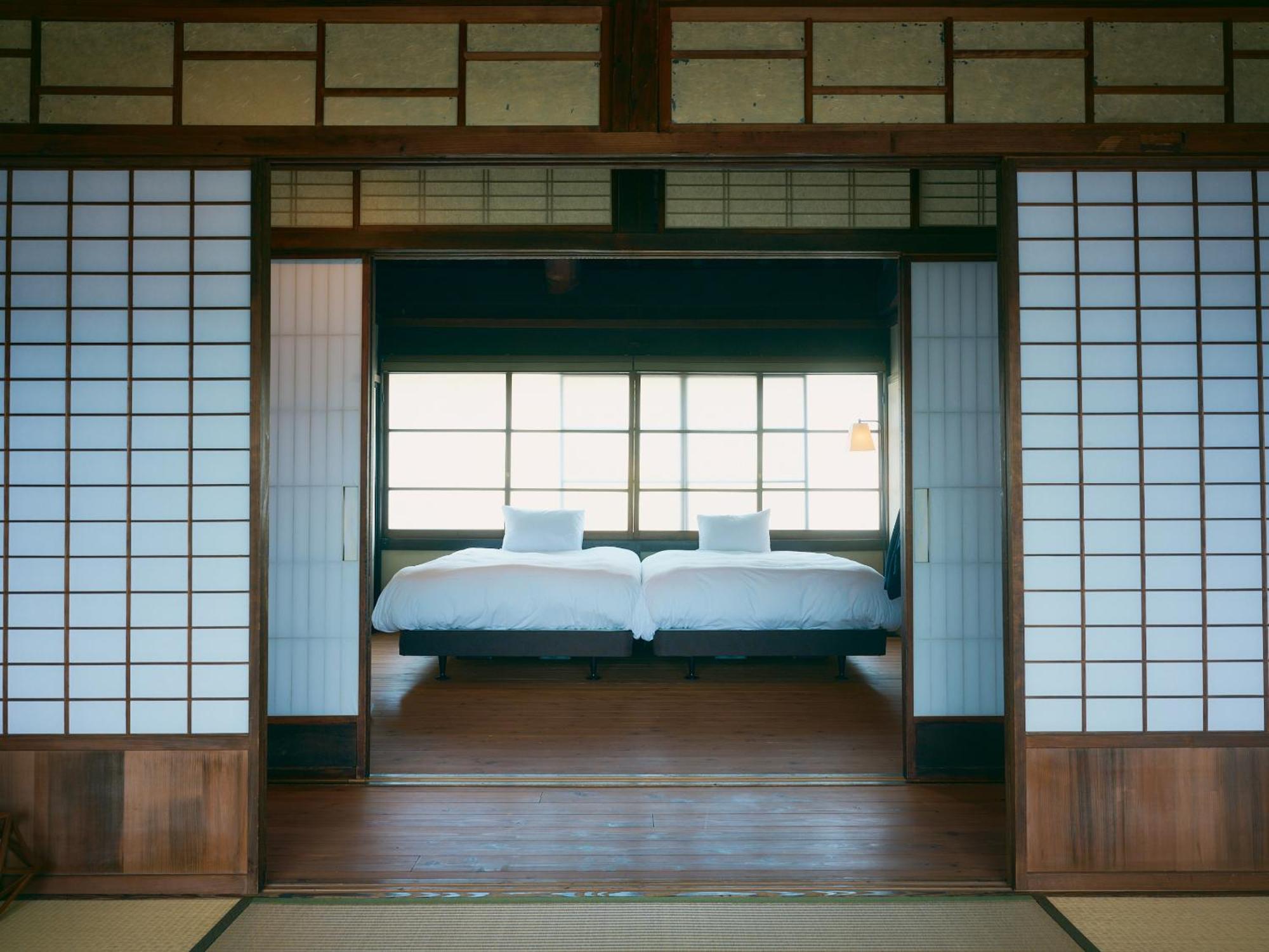 Отель Nipponia Chichibu Monzenmachi Экстерьер фото